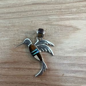 Sterling silver Hummingbird pendant by Calvin Begay Navajo